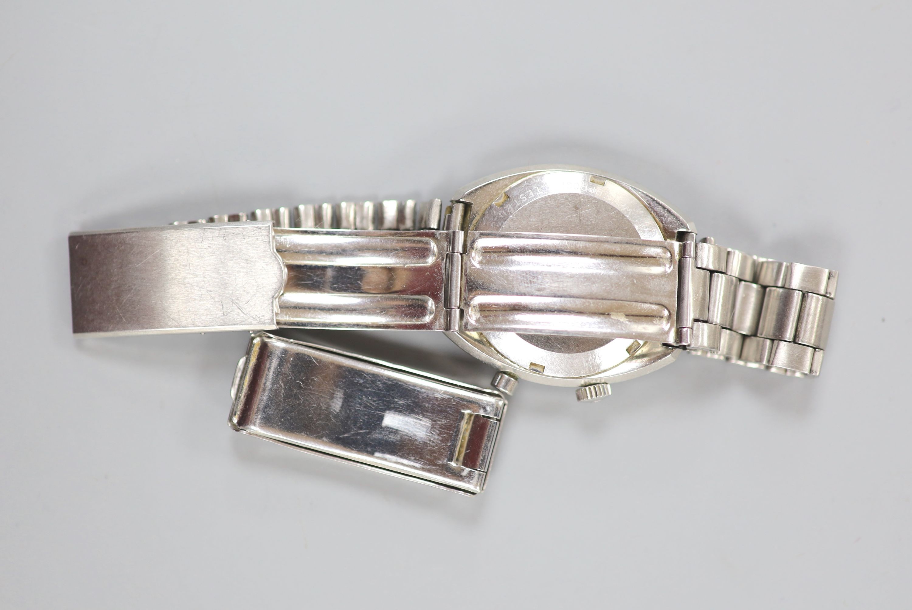 A gentleman's 1960's/1970's stainless steel Omega Chronostop wrist watch, on associated bracelet and detaches Omega clasp, case diameter 32mm.